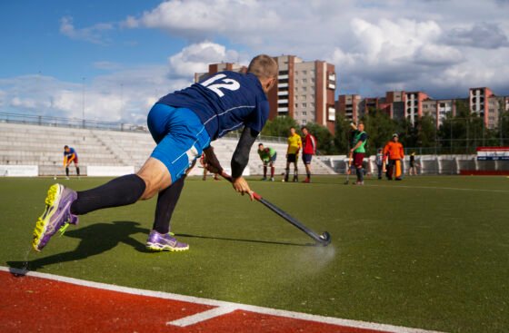 field-hockey-player-training-practicing-sport-grass